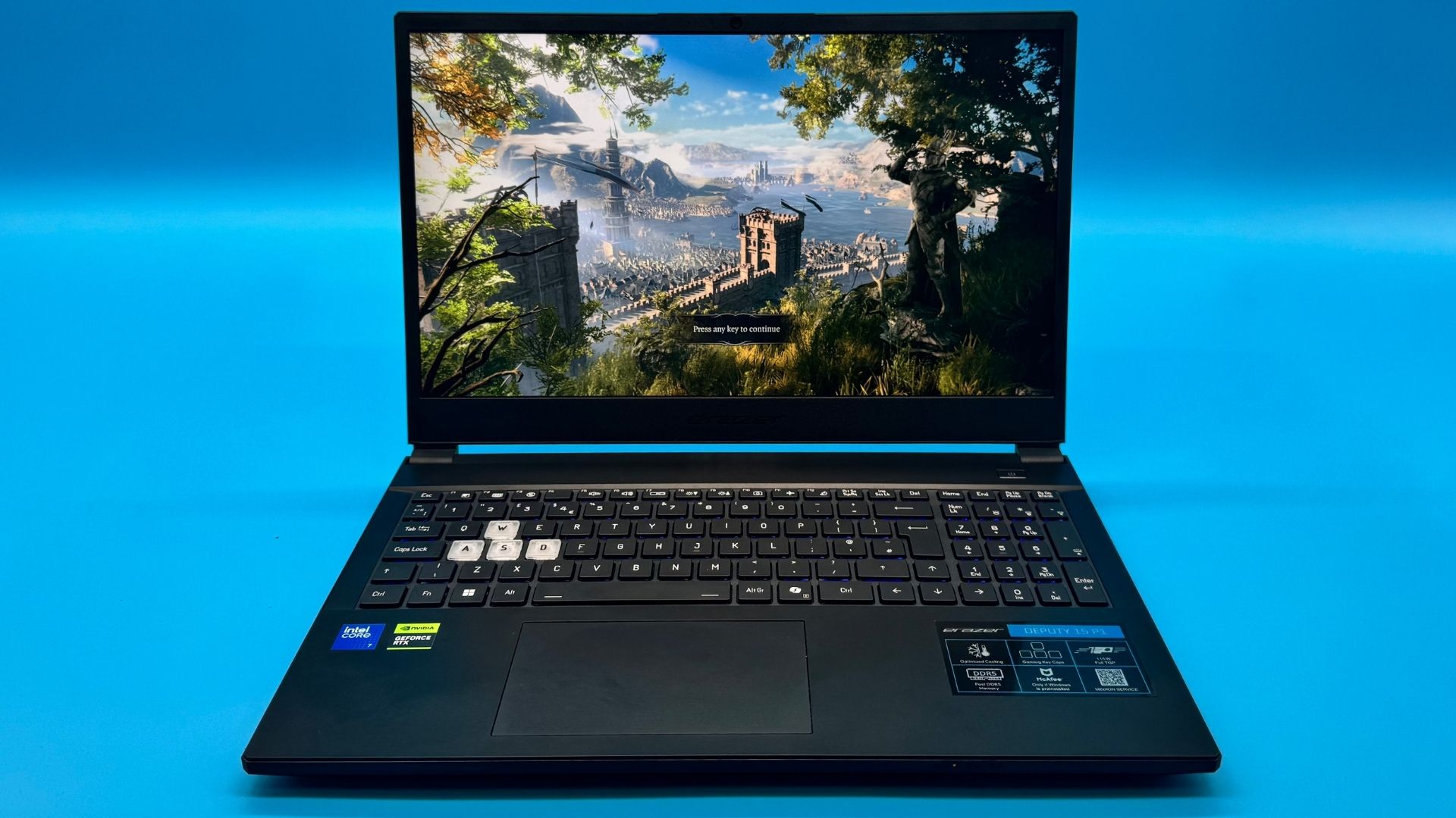 A picture of the front of the Medion Erazer Deputy 15 P1 gaming laptop with Baldur's Gate 3 on the screen