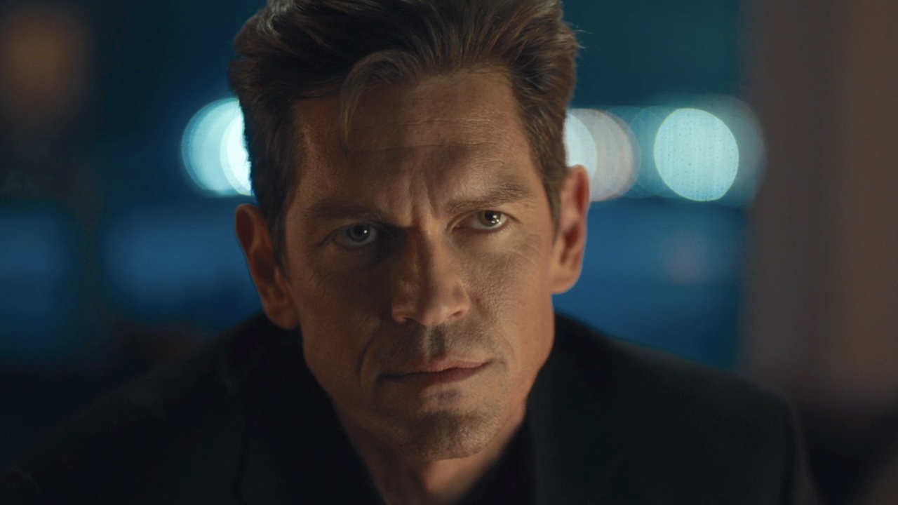 Close-up of Nick Wagner's face as he's sitting in a bar in High Potential Season 2