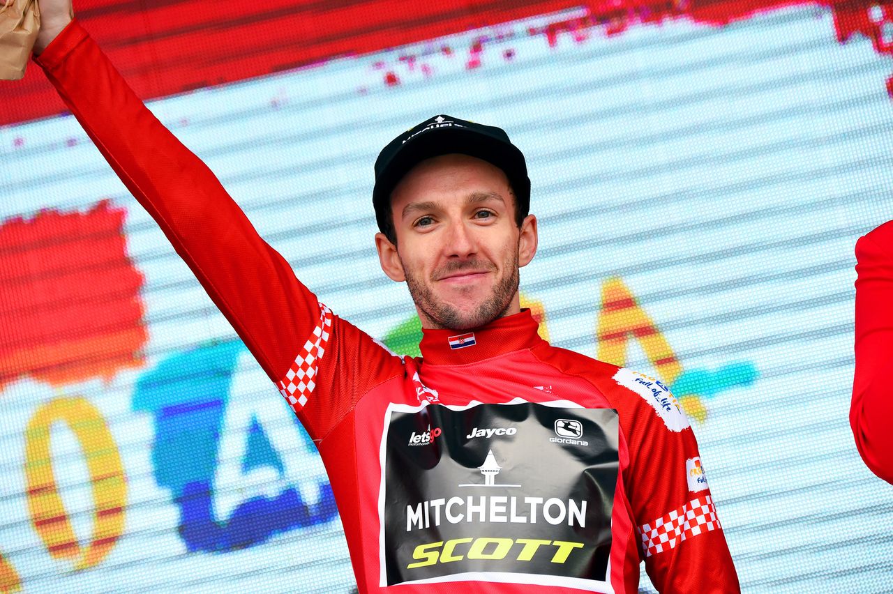 Adam Yates in red after the stage