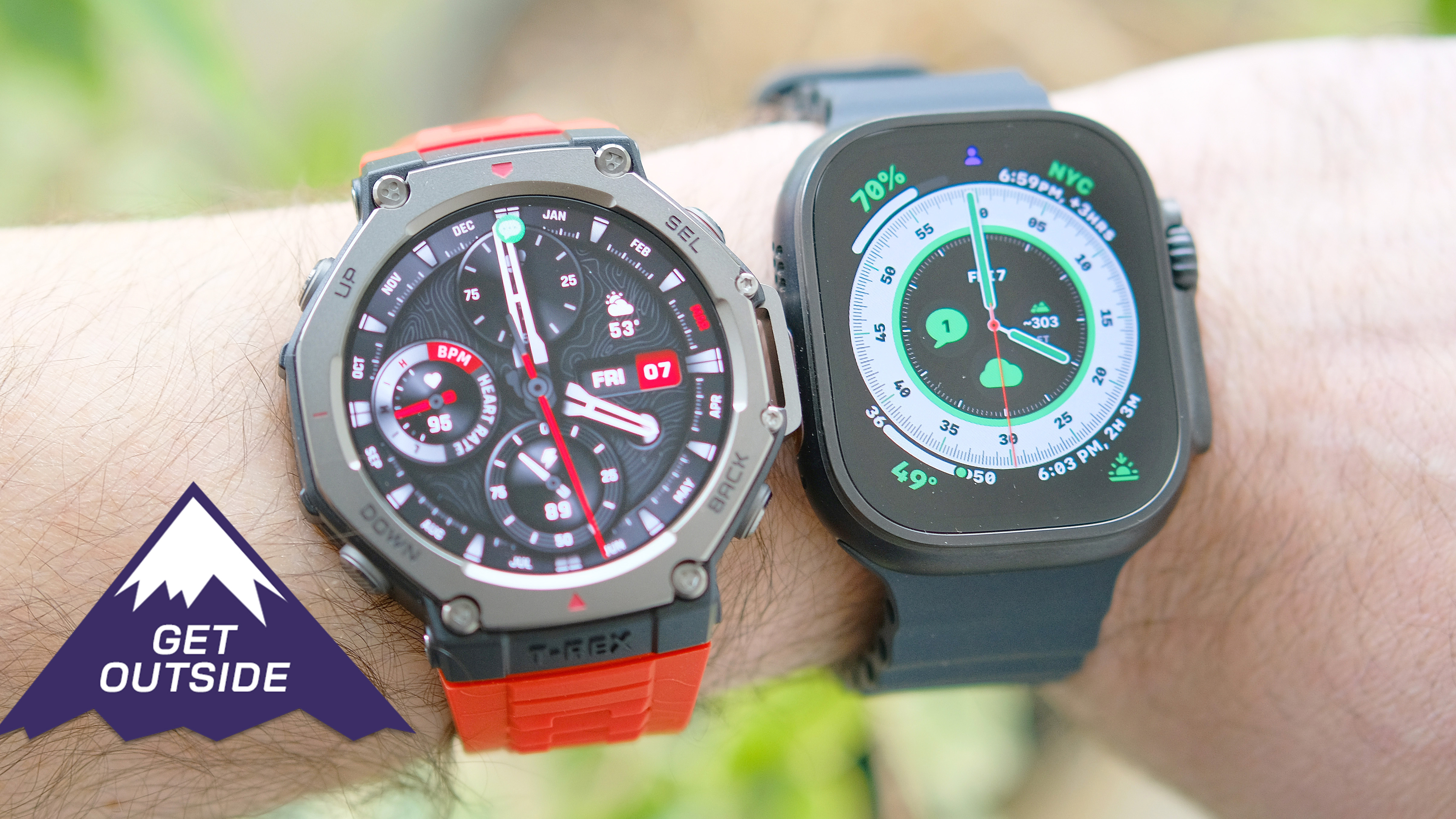 Apple Watch Ultra 2 on a black silicone strap and Amazfit T-Rex 3 on an orange silicone strap shown side-by-side on a user&#039;s wrist