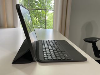 Zagg Pro Keys With Trackpad Wireless Keyboard With Trackpad And Detachable Case Upright Angle Lifestyle