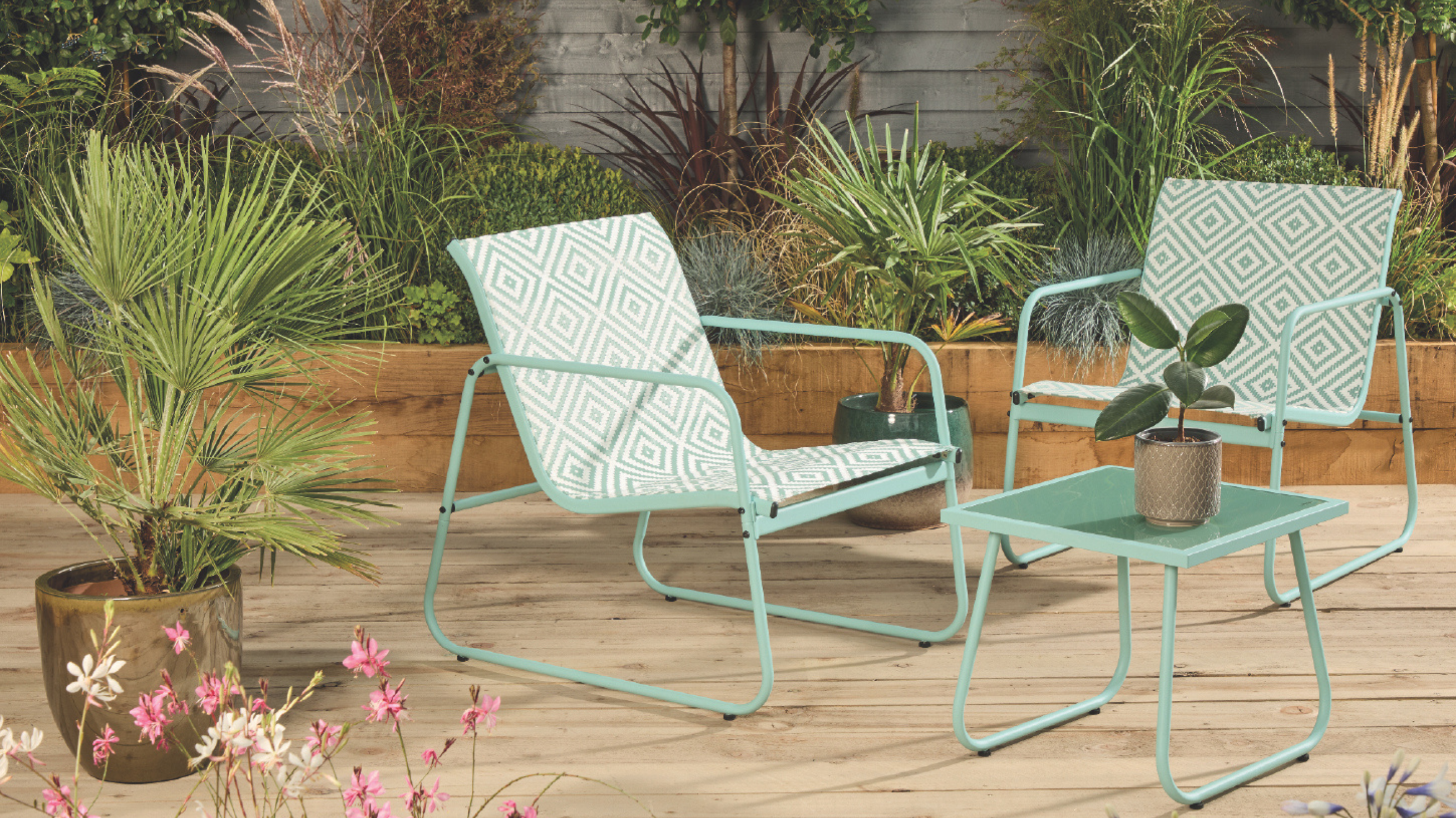 Aztec patio set in blue on a wood patio.