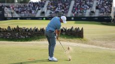 Rory McIlroy hits an approach into the final green at the Genesis Scottish Open