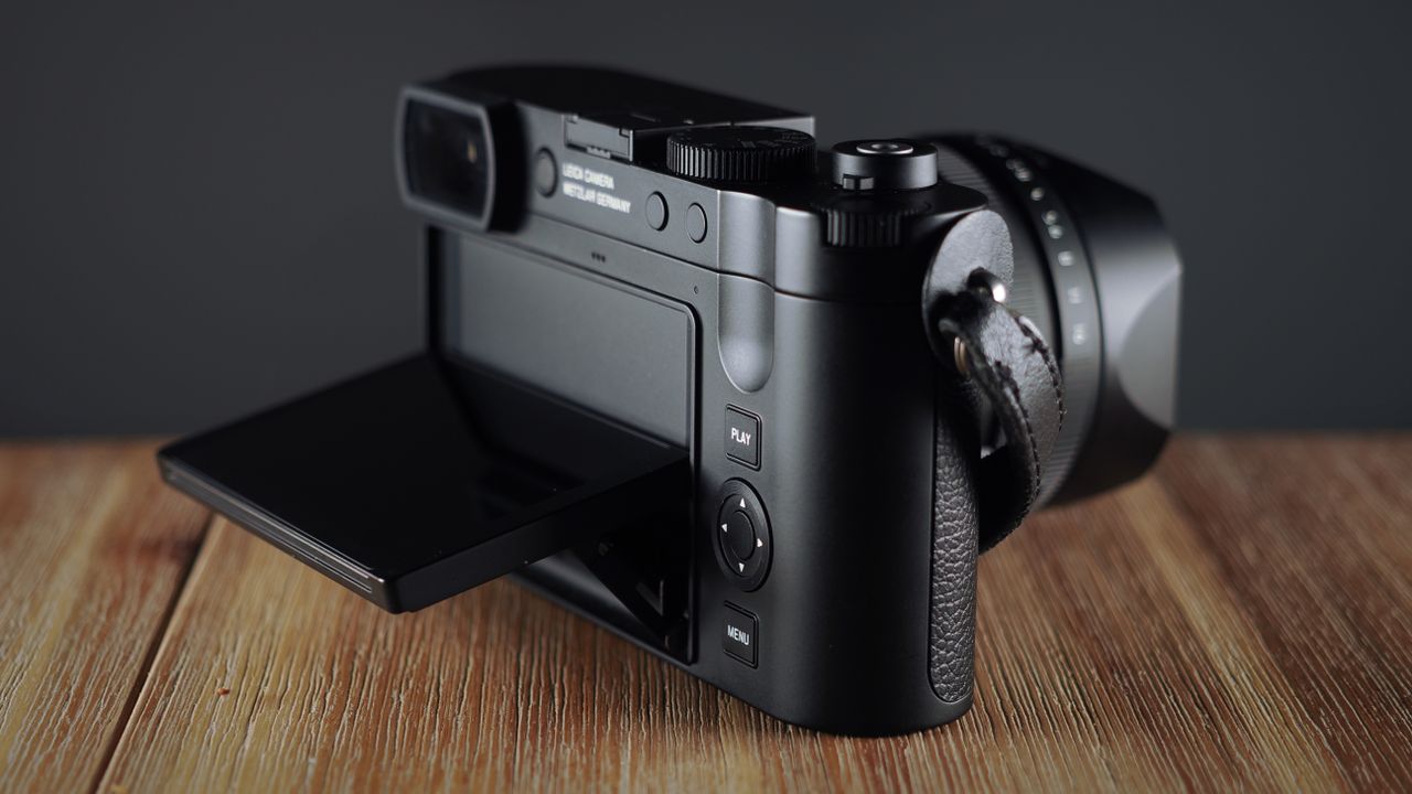 Leica Q3 Monochrom on a wooden surface
