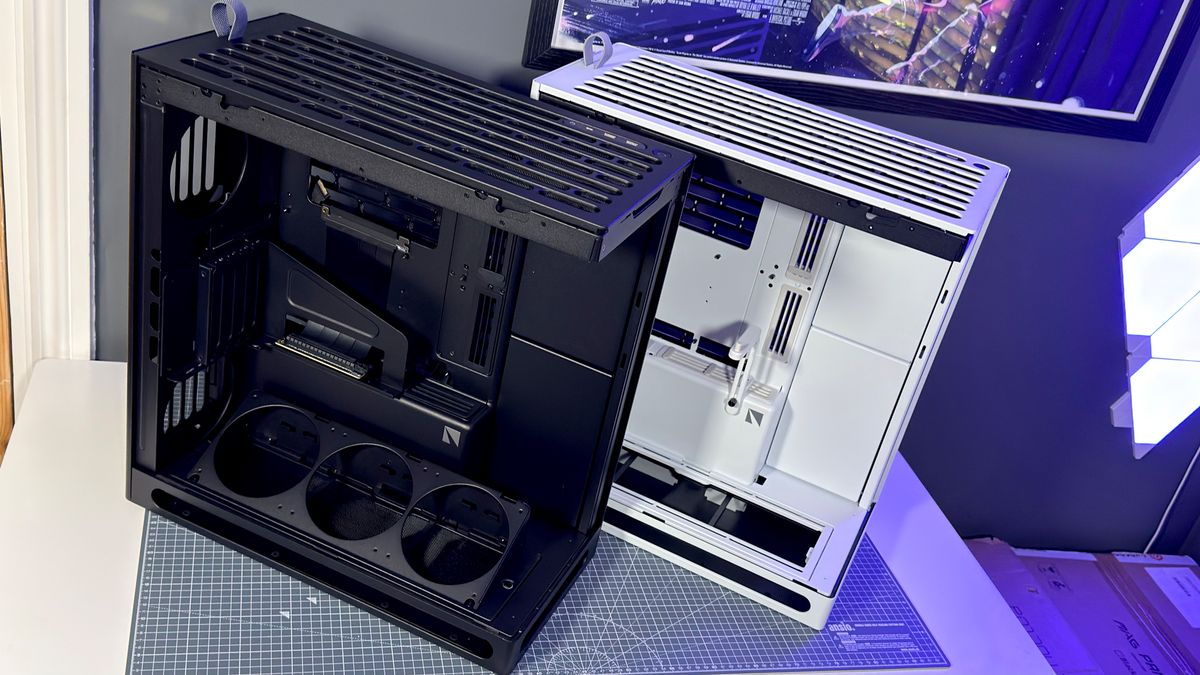 The Havn HS 360 PC case in black and white on a desk.