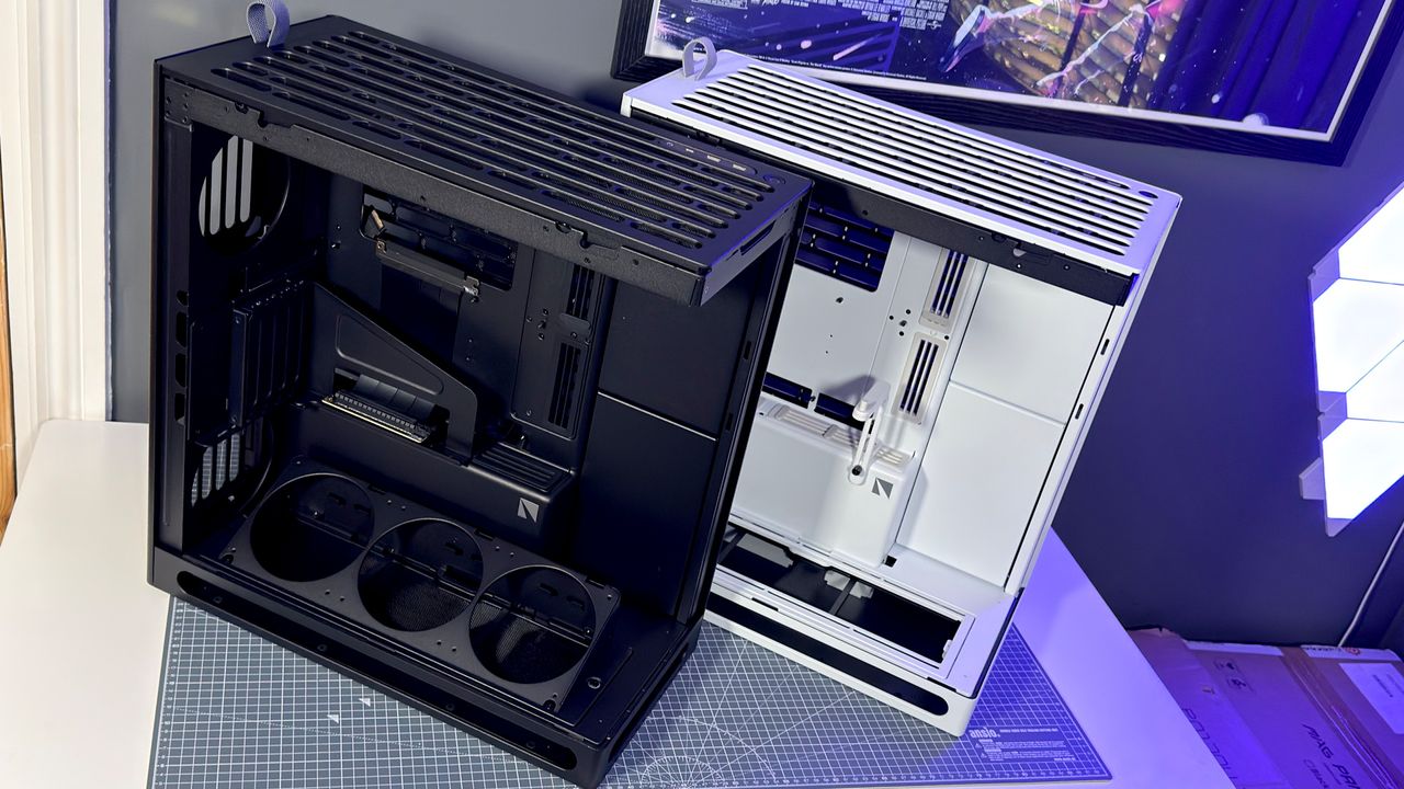 The Havn HS 360 PC case in black and white on a desk.
