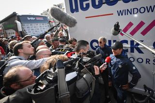 Belgiums Remco Evenepoel R of Deceuninck QuickStep speaks to the press at the start of the 74th edition of the Nokere Koerse Danilith Classic cycling race in Nokere Kruishoutem Photo by DAVID STOCKMAN Belga AFP Belgium OUT Photo credit should read DAVID STOCKMANAFP via Getty Images