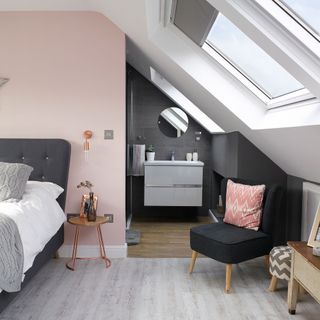 Pink and grey bedroom with grey chair