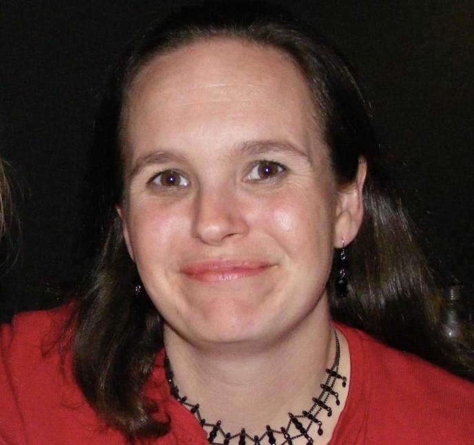 a headshot of Nola Taylor Tillman