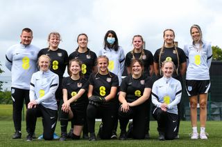 Natasha Mead (back row, second from left) with her fellow members of the new England women’s blind team at St George’s Park (FA Handout/PA).