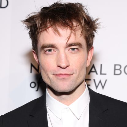 Robert Pattinson in a black suit jacket and white shirt at The National Board of Review Annual Awards Gala in January 2025