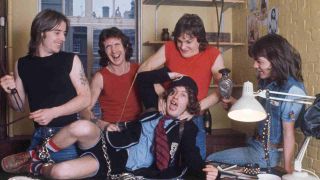 AC/DC posing for a photograph in 1976