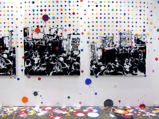 Black & white art with colourful paint splats