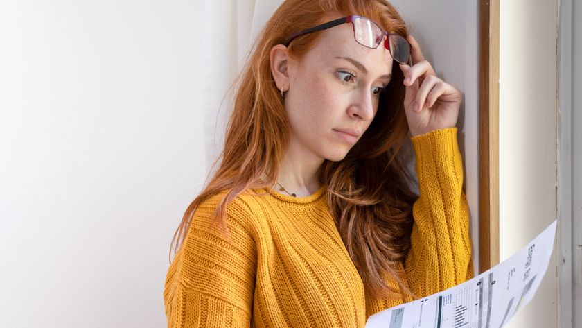 woman looking at high bill 