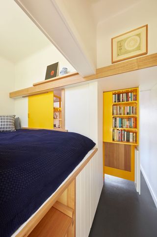 a bedroom in a studio apartment