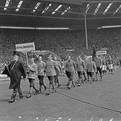 A parade of historical FA Cup winners during the FA Cup final at Wembley in London, to celebrate the centenary of the trophy, UK, 6th May 1972. The Wanderers, Oxford University and the Royal Engineers won the first seven finals between them, beginning with the 1871-72 season.