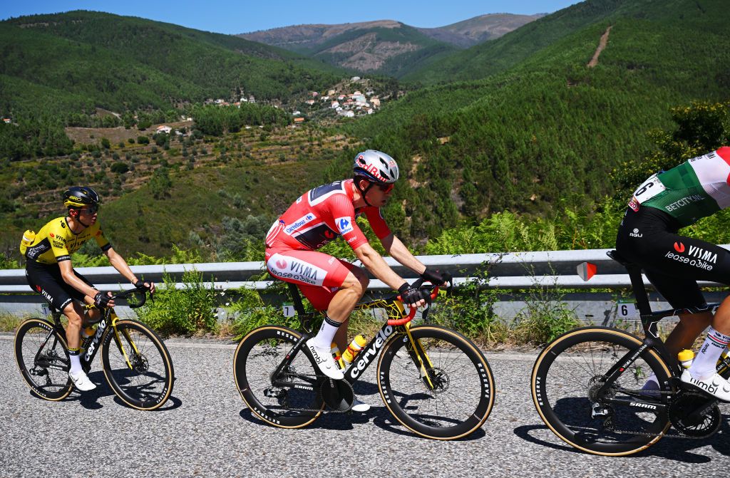 CASTELO BRANCO PORTUGAL AUGUST 19 LR Sepp Kuss of The United States and Wout van Aert of Belgium and Team Visma Lease a Bike Red Leader Jersey compete during the La Vuelta 79th Tour of Spain 2024 Stage 3 a 1915km stage from Lousa to Castelo Branco UCIWT on August 19 2024 in Castelo Branco Portugal Photo by Dario BelingheriGetty Images