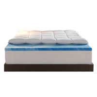 Sleep Innovations Dual Layer Memory Foam Mattress Topper
This comfy, 4-inch mattress topper won't break the bank priced at $160 or less. Its medium level of support allows it to support various sleep styles, and the fitted cover can be removed and laundered in the washing machine for easy cleaning. Just a heads up that the cooling gel foam may not be enough to prevent overheating.
Read more: