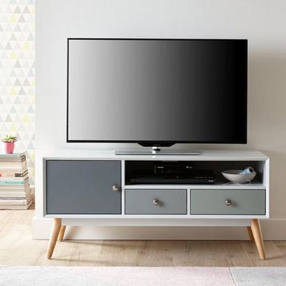 room with tv unit white wall and wooden flooring