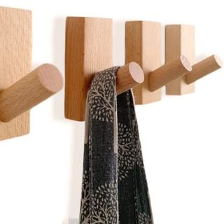 Wooden storage hooks on a wall