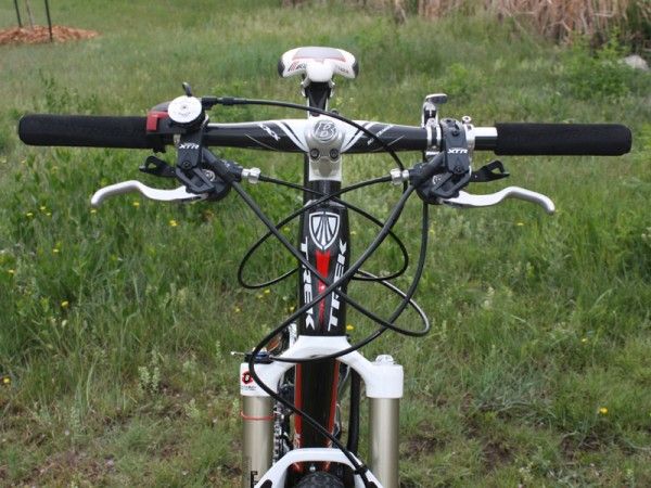Separate lockout levers for both the rear shock and fork make for a crowded front end.