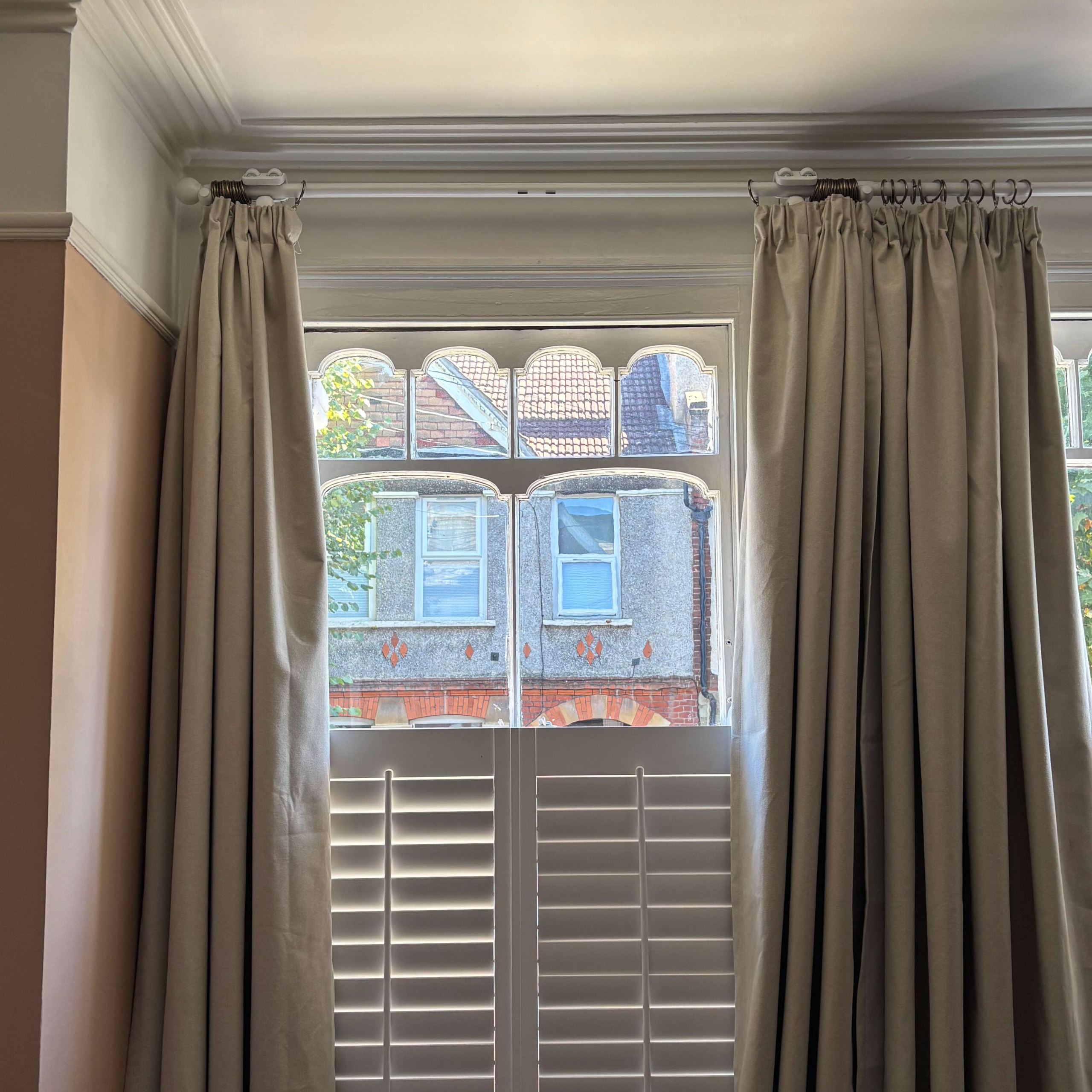 Floor length curtains with a switchbot on the curtain rod