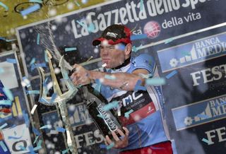 Cadel Evans celebrates his Tirreno-Adriatico victory on the podium.