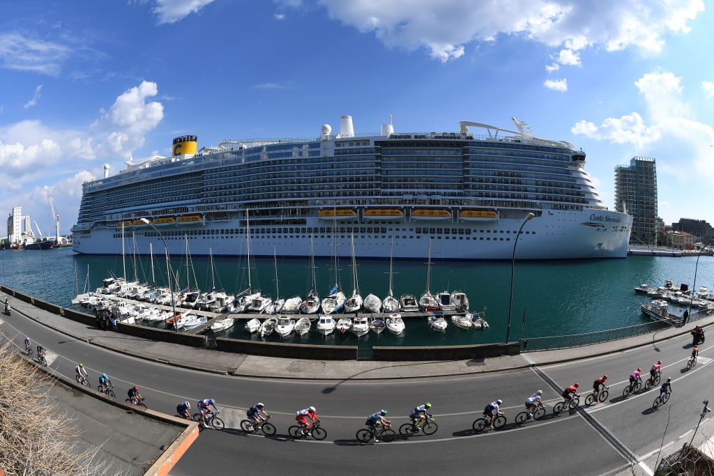 SANREMO ITALY MARCH 20 The Peloton passing through Savona City during the 112th MilanoSanremo 2021 a 299km race from Milano to Sanremo Landscape Harbour Boat MilanoSanremo La Classicissima UCIWT on March 20 2021 in Sanremo Italy Photo by Tim de WaeleGetty Images