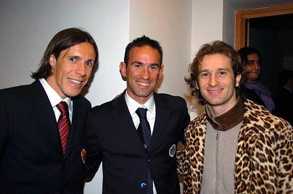 Taddei, Elio Aggiano and Trulli gather for a photo.