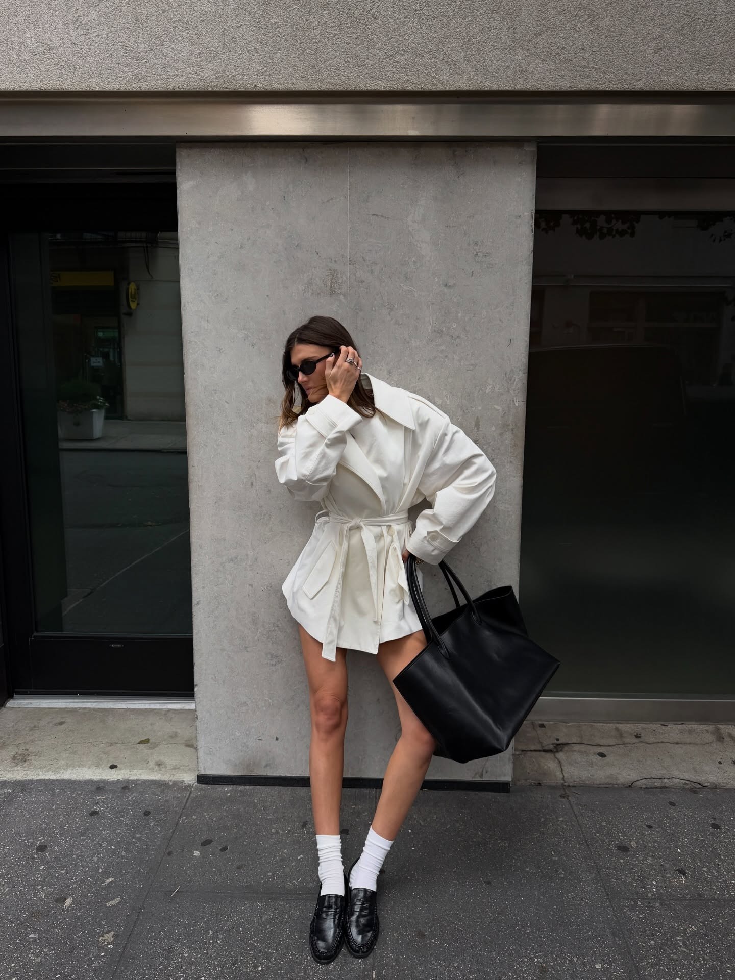 Woman wearing fall outfit with loafers.