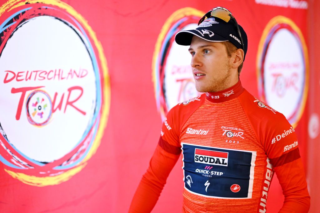 WINTERBERG GERMANY AUGUST 25 Ilan Van Wilder of Belgium and Team Soudal Quick Step Red Leader Jersey winner meets the media press after the 38th Deutschland Tour 2023 Stage 2 a 2013km stage from Kassel to Winterberg 629m on August 25 2023 in Winterberg Germany Photo by Christian KasparBartkeGetty Images