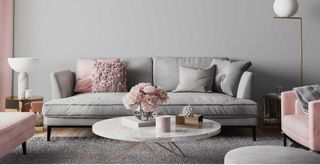 Pale grey and dusky pink living room with warm metallic accents