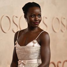 Lupita Nyong'o wearing custom Chanel at the 2025 Oscars