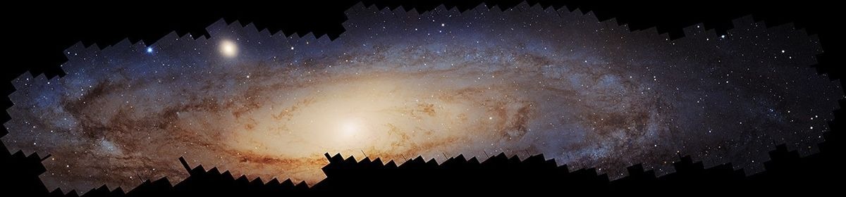 A panoramic view of the neighboring Andromeda galaxy, located 2.5 million light-years away, requiring over 600 Hubble overlapping snapshots to stitch together. This mosaic captures the glow of 200 million stars - a fraction of Andromeda’s population - spread across about 2.5 billion pixels.