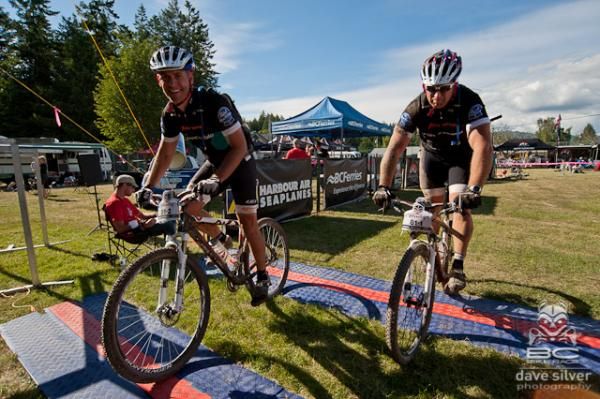 Dean Hastriter and Dan Henderson (George's Cycles) cross the line.