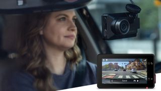 Woman driving car with Garmin Dash Cam X