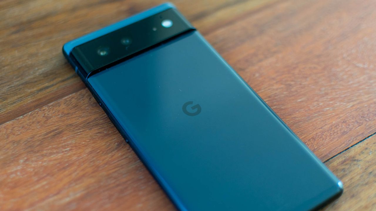 A photograph of the Google Pixel 6 face-down on a table