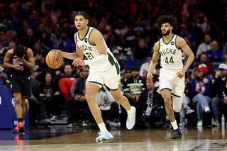 PHILADELPHIA, PENNSYLVANIA - APRIL 12: Ousmane Dieng #21 of the Milwaukee Bucks dribbles the ball during the second half against the Philadelphia 76ers at Xfinity Mobile Arena on April 12, 2026 in Philadelphia, Pennsylvania. NOTE TO USER: User expressly acknowledges and agrees that, by downloading and or using this photograph, User is consenting to the terms and conditions of the Getty Images License Agreement. (Photo by Emilee Chinn/Getty Images)