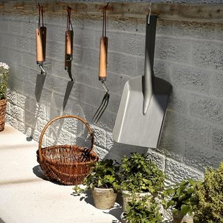 potting table with garden tools