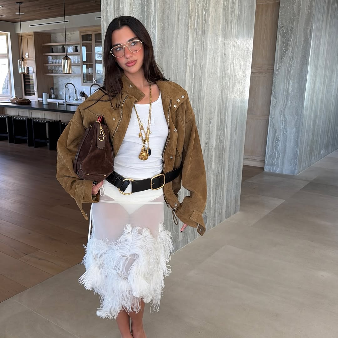 Dua Lipa wore the suede version of the east-west Gucci Borsetto Bag on Instagram