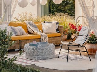 boho garden with furniture and lights