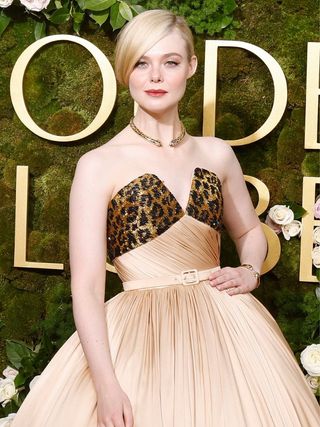 Elle Fanning Golden Globes side fringe hairstyle