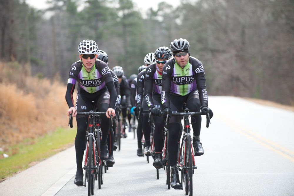 19-year-old Jonah Mead-Van Court and 40-year-old Michael Olheiser lead the group on a ride.