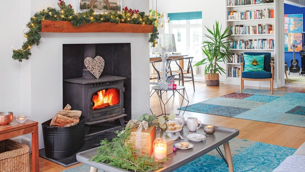 sitting area with fireplace and wooden floor