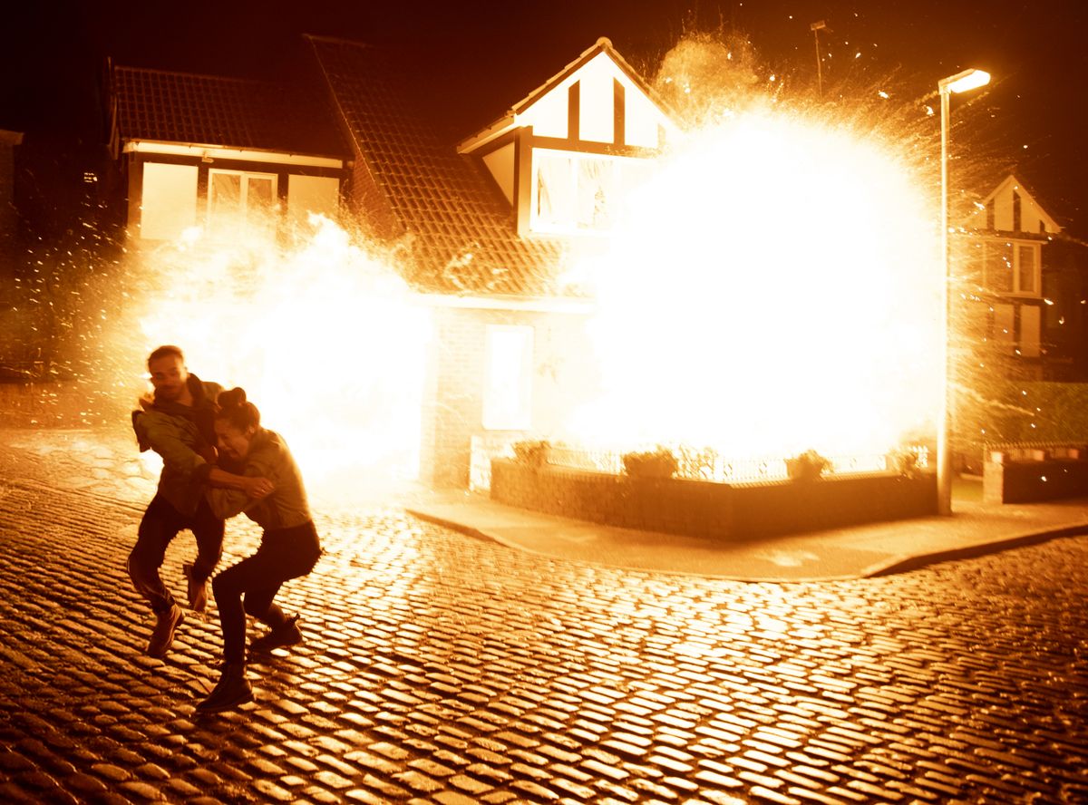 The residents try to escape the arson attack on Coronation Street.