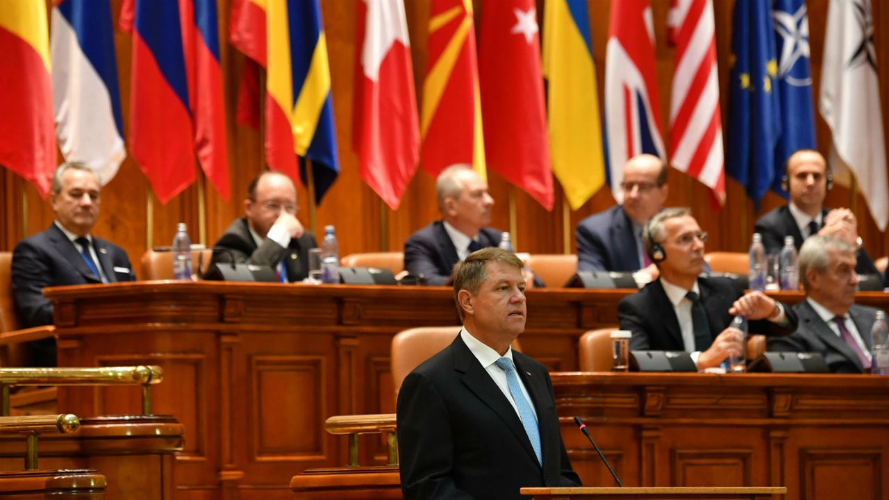 Romania&amp;#039;s President Klaus Iohannis delivers a speech in front of NATO&amp;#039;s Parliamentary Assembly on Monday