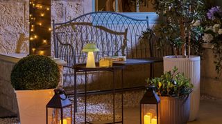 Aldi's solar-powered lamp on a garden bench