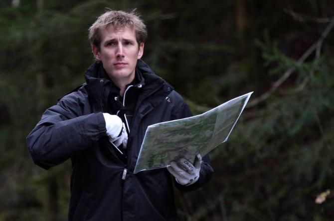 Road map to success? Andy Schleck weighs up his options in the woods of the Luxembourg Ardennes.
