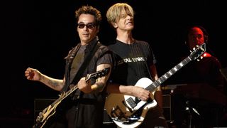 Earl Slick and David Bowie during David Bowie Gives Fans a Strong Dose of "A Reality Tour" at Special Poughkeepsie Warm Up Show For His Upcoming World Tour at The Chance Nghtclub in Poughkeepsie, New York, United States