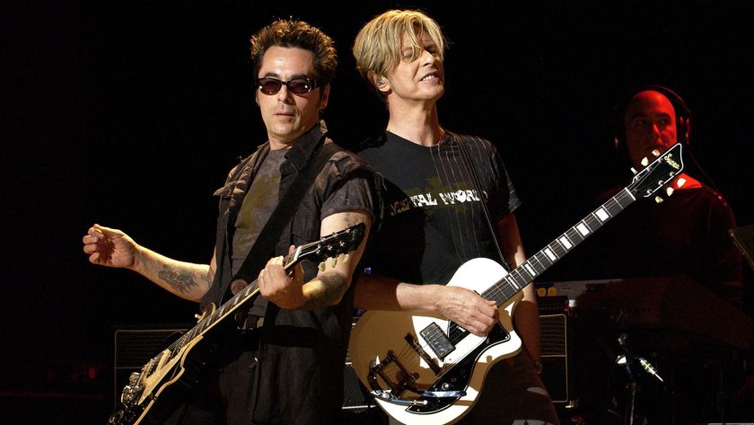 Earl Slick and David Bowie during David Bowie Gives Fans a Strong Dose of &quot;A Reality Tour&quot; at Special Poughkeepsie Warm Up Show For His Upcoming World Tour at The Chance Nghtclub in Poughkeepsie, New York, United States